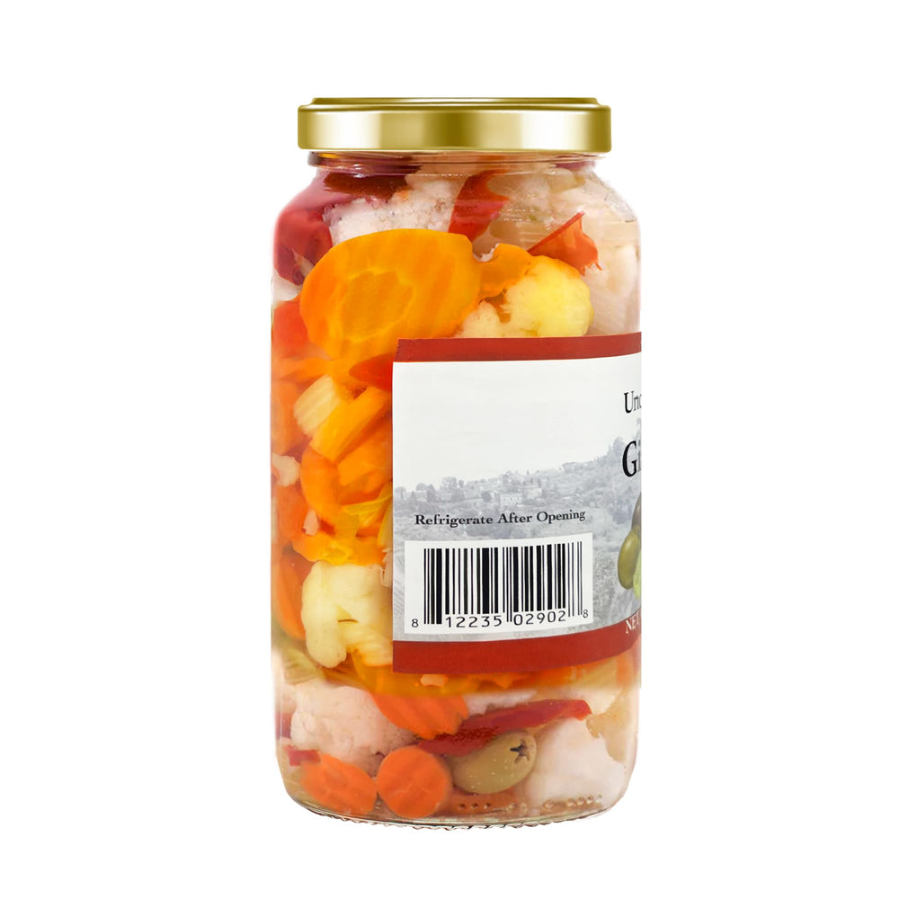 Uncle Giuseppe's spoon scooping giardiniera to show easy serving and convenience