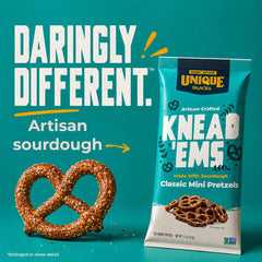 Unique Snacks Knead 'Ems in hand for size comparison showing bite-sized pretzels ideal for portable snacking
