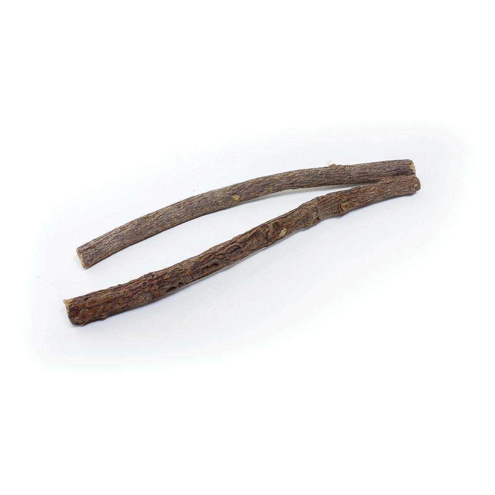 Unknown peppermint chew sticks on a desk with notebook showing portable freshening benefit