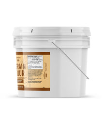 Unpretentious flour mixed into dough in a bowl for easier bread making