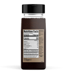 Unpretentious black cocoa powder close-up texture highlights fine grind and richness