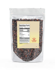 Unpretentious close-up of black japonica rice grains, displays nutty texture and color contrast