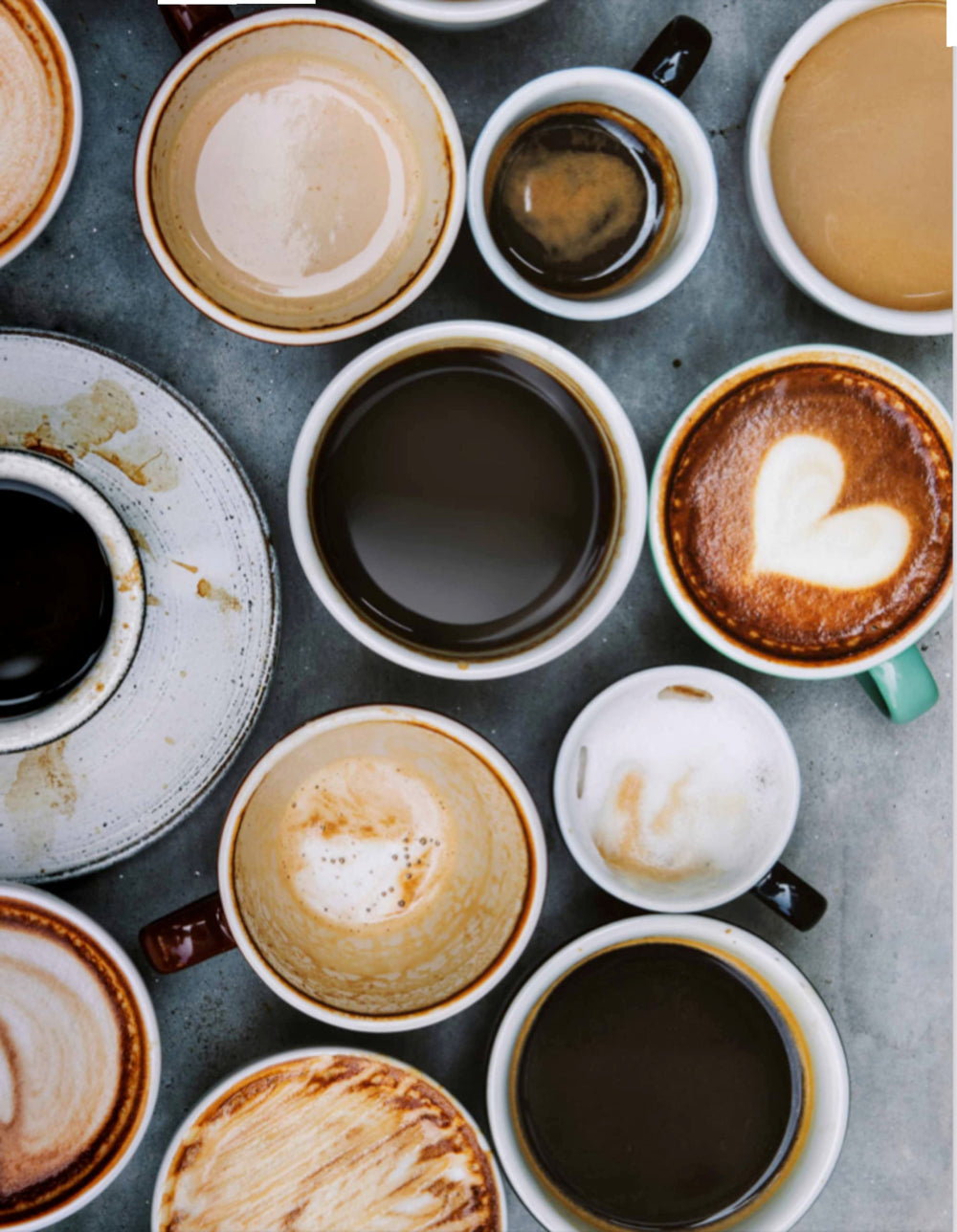 UPOURIA bottles beside a coffee cup showing 750ml scale and value