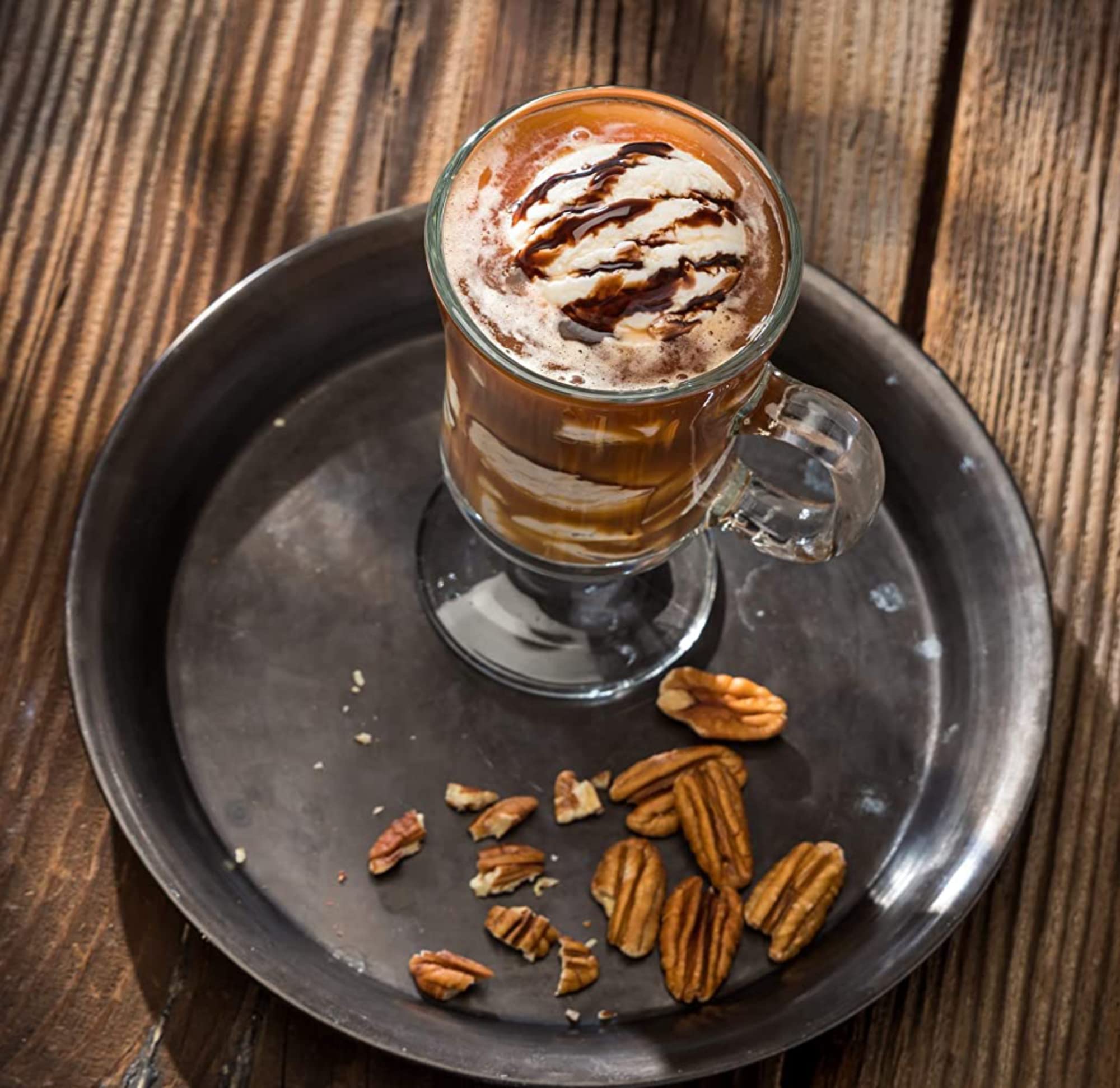 Upouria served in latte top view with foam, benefit: bakery-style coffee at home