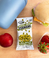 Urbani single 0.9 oz bag in hand, portable snack for travel and work
