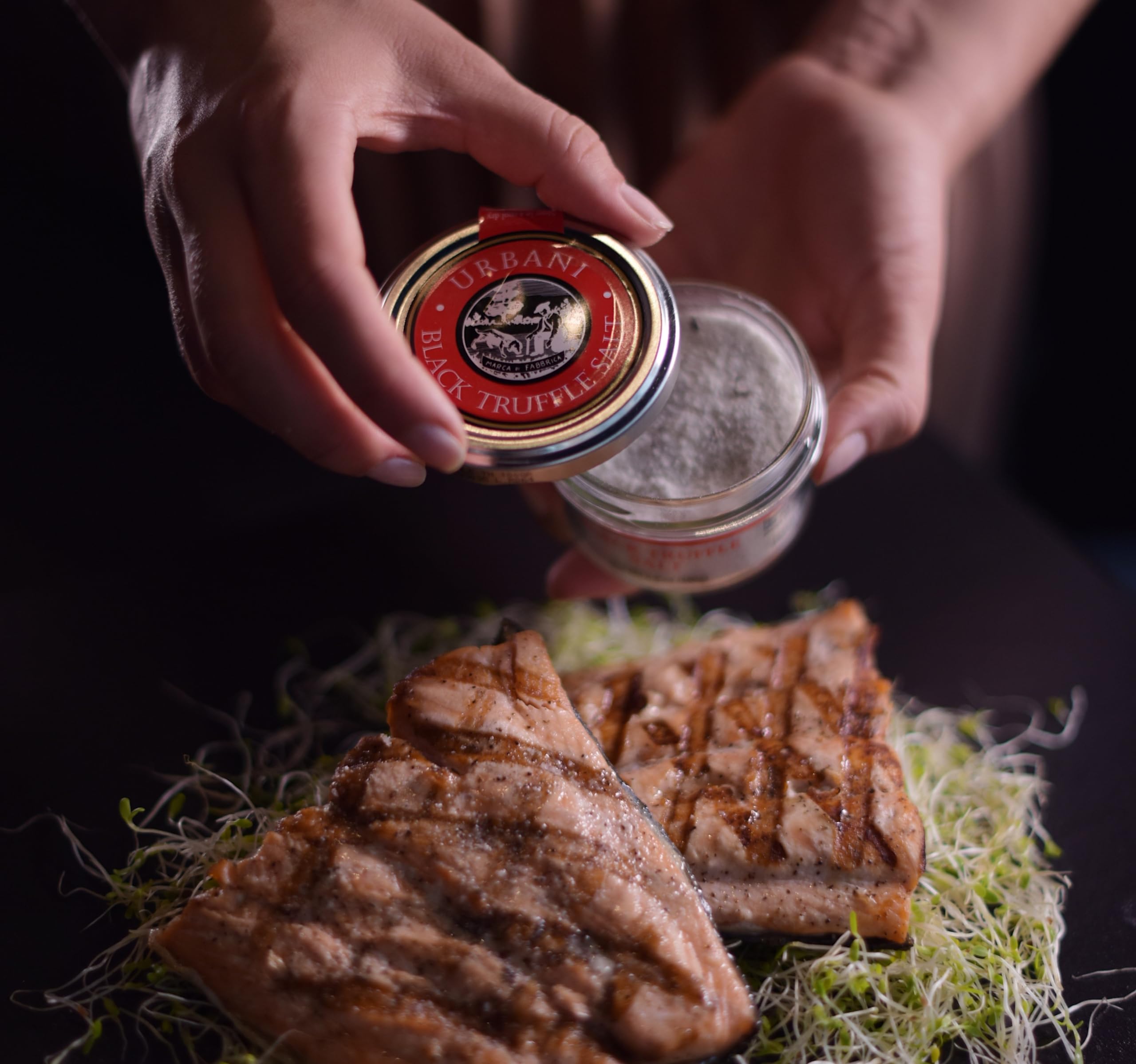 Urbani Truffles detailed view of real black truffle pieces mixed in salt to show authenticity
