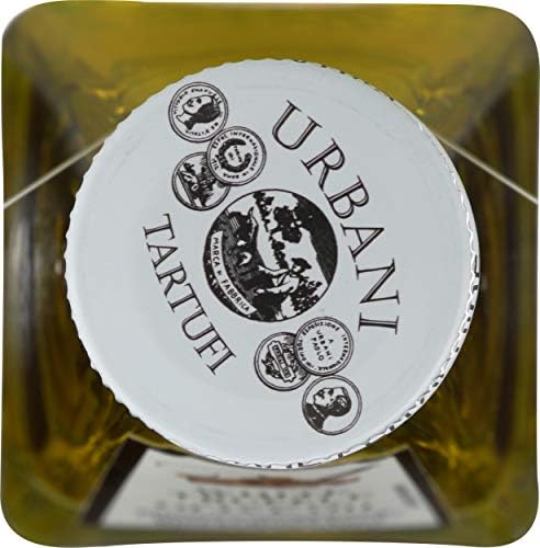 Urbani Truffles drizzled on risotto adding aromatic flavor and visual appeal