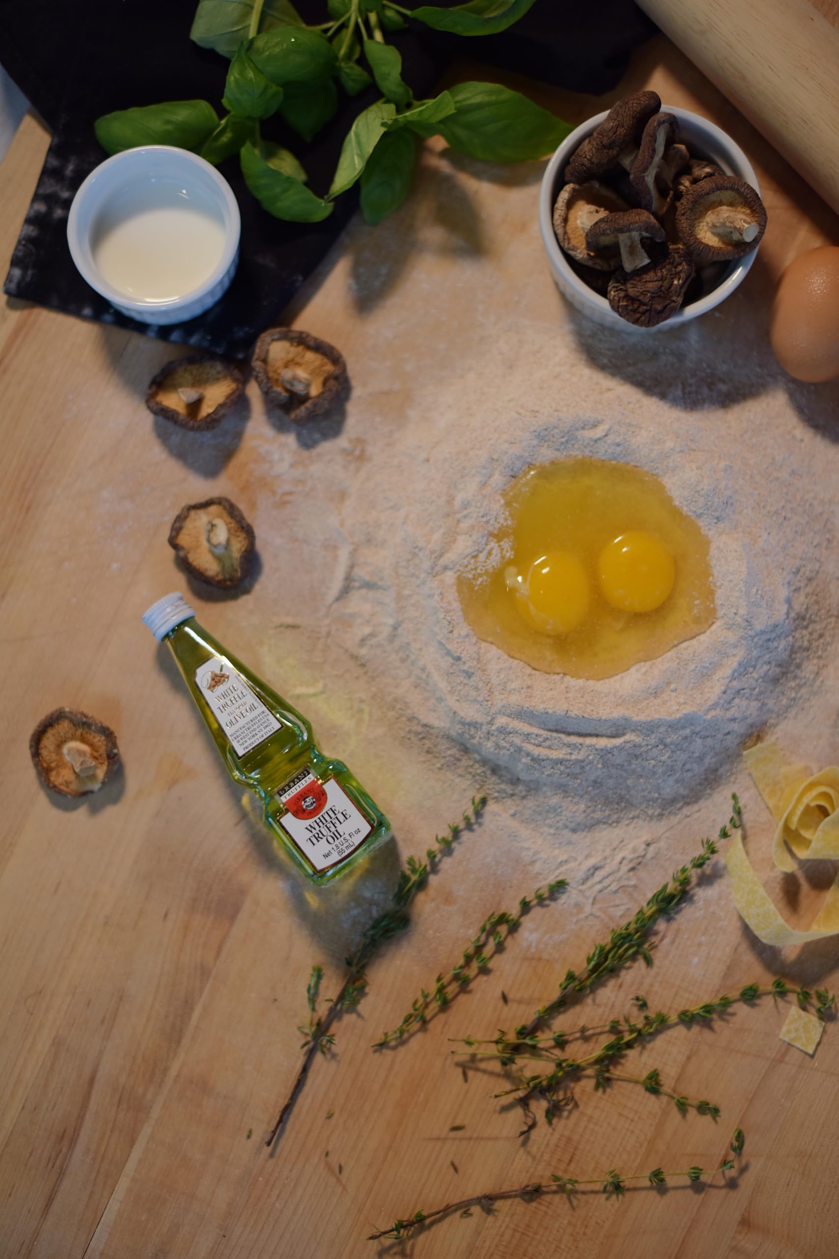 urbani truffles oil poured over pasta adding instant gourmet aroma benefit