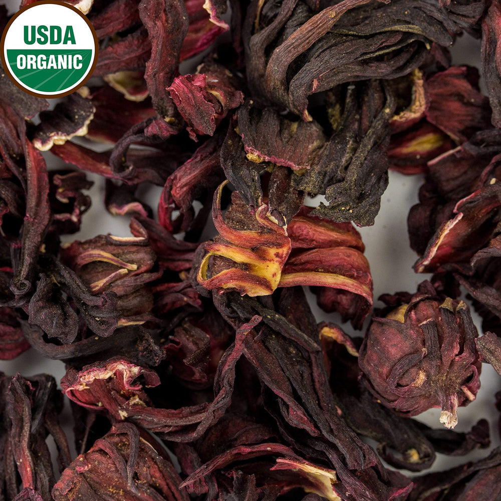 U.S. Wellness Naturals hibiscus syrup in jar illustrating culinary versatility and color