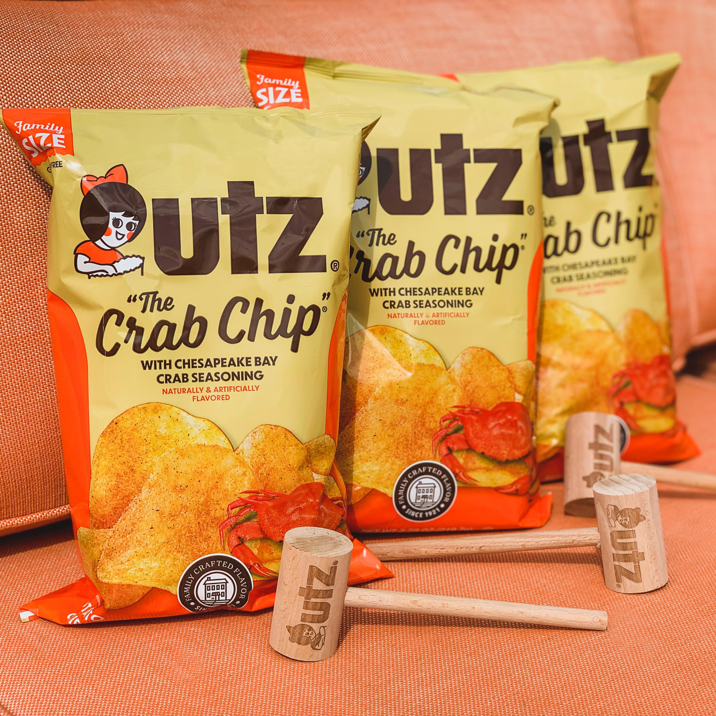 Utz chips served on a plate beside a sandwich showing a tasty meal pairing