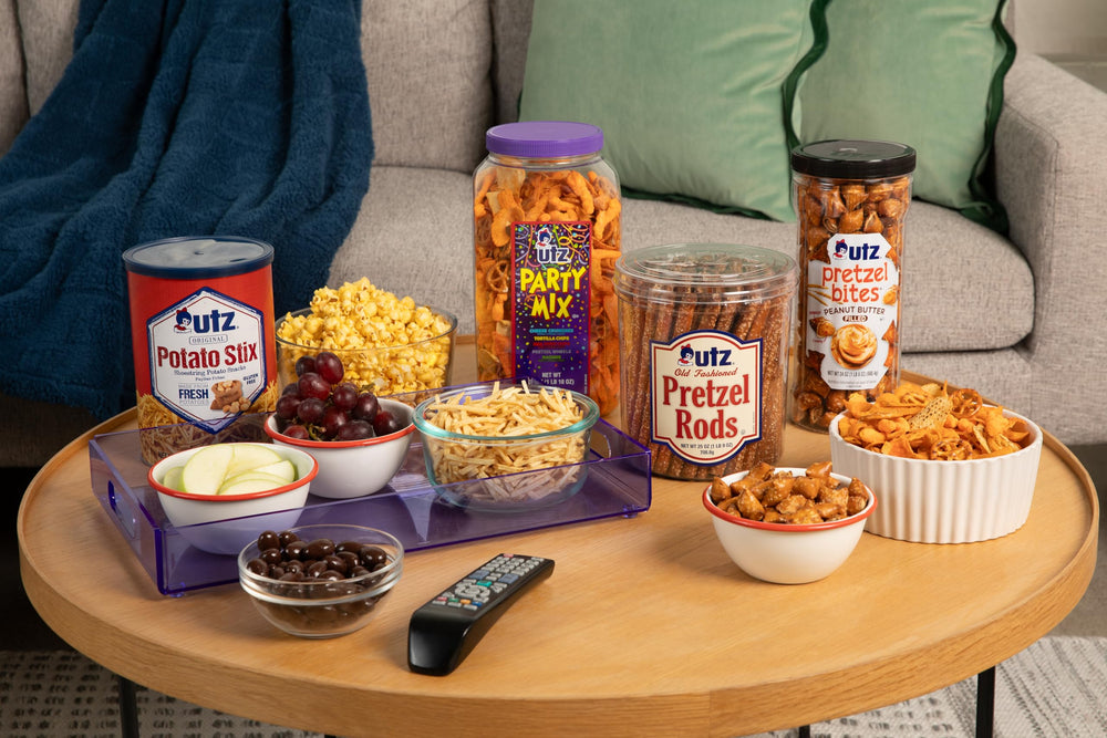 utz barrel beside a soda can for size comparison and portion guidance