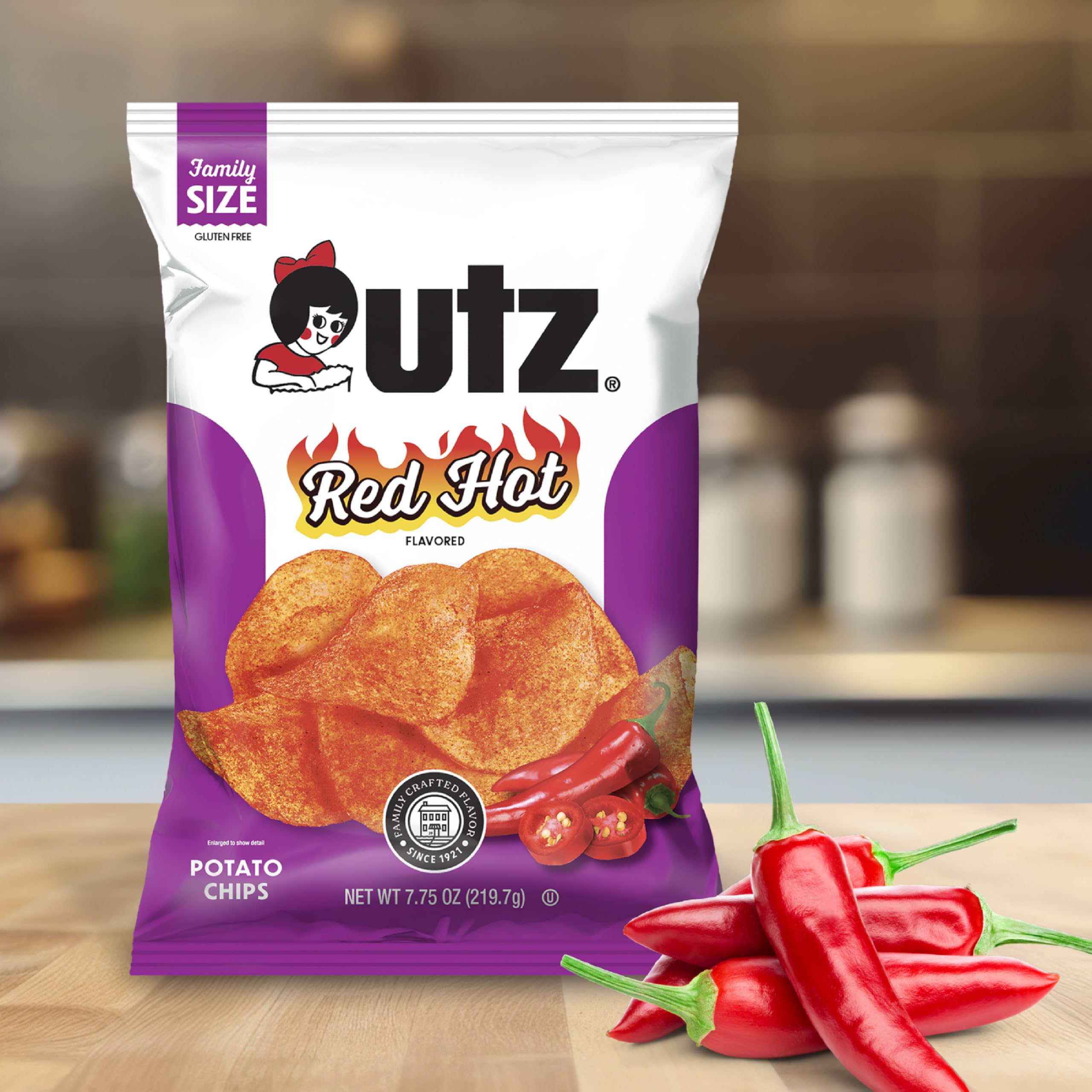 Utz bag held in hand to show 2.75 oz size and travel-friendly convenience