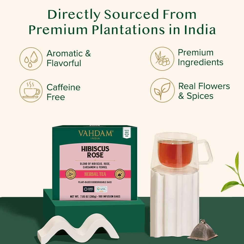 VAHDAM brewed cup of hibiscus rose tea showcasing bright color and refreshment