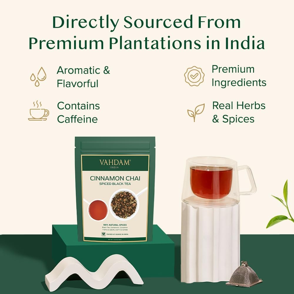 VAHDAM brewed cup with milk showcasing rich cinnamon-spiced flavor