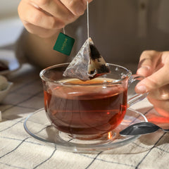 VAHDAM Darjeeling Spring poured into cup highlighting delicate floral aroma