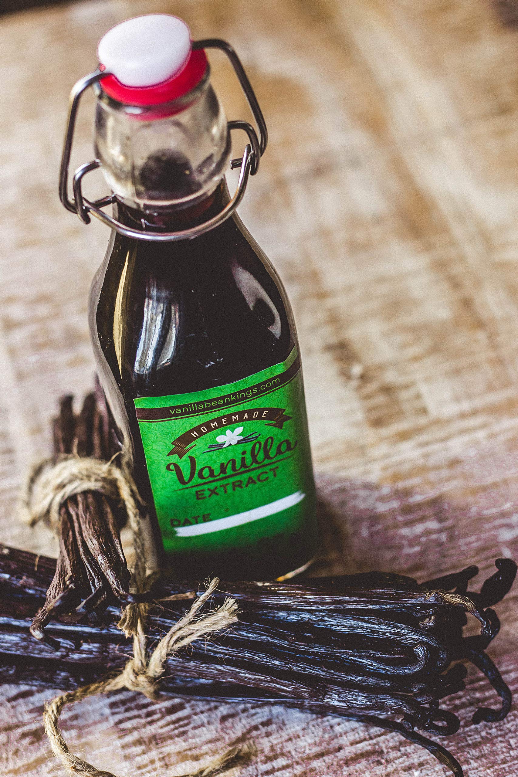 Vanilla Bean Kings pods being scraped over batter to add visible vanilla specks and aroma