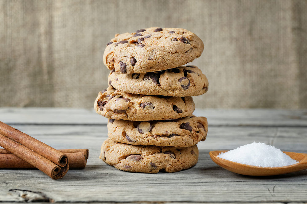 Vanilla Bean Kings chef using extract in kitchen showcasing professional baking benefit