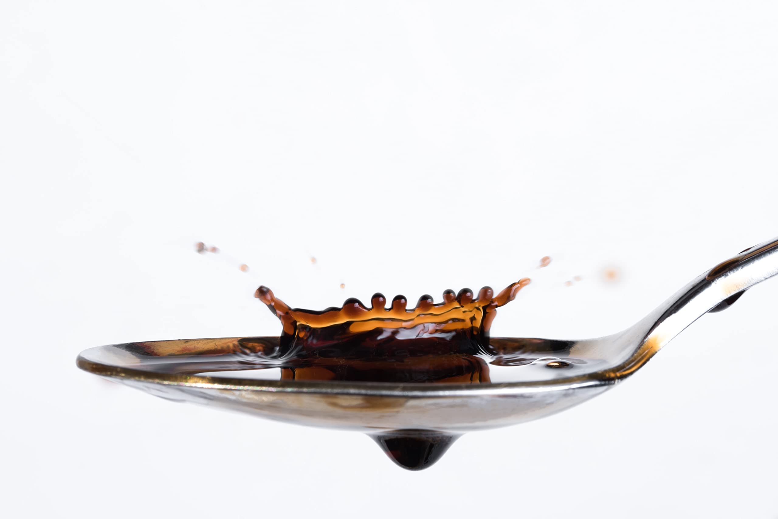 Vanilla Bean Kings extract texture in bowl showing rich creamy aroma benefit