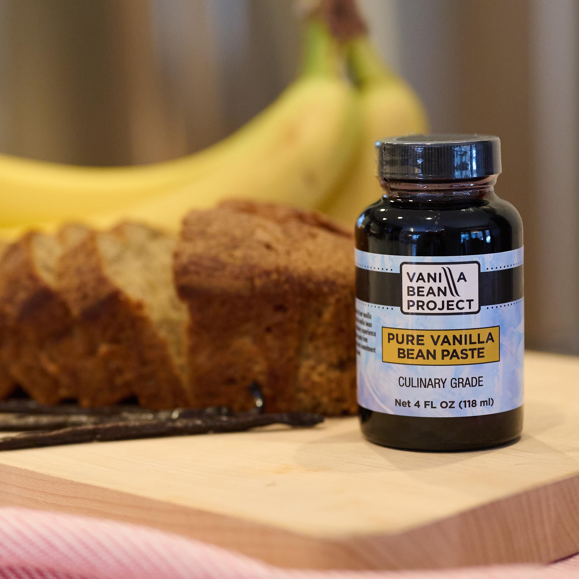 VANILLA BEAN PROJECT jar next to ruler for 4 oz scale and portion guidance