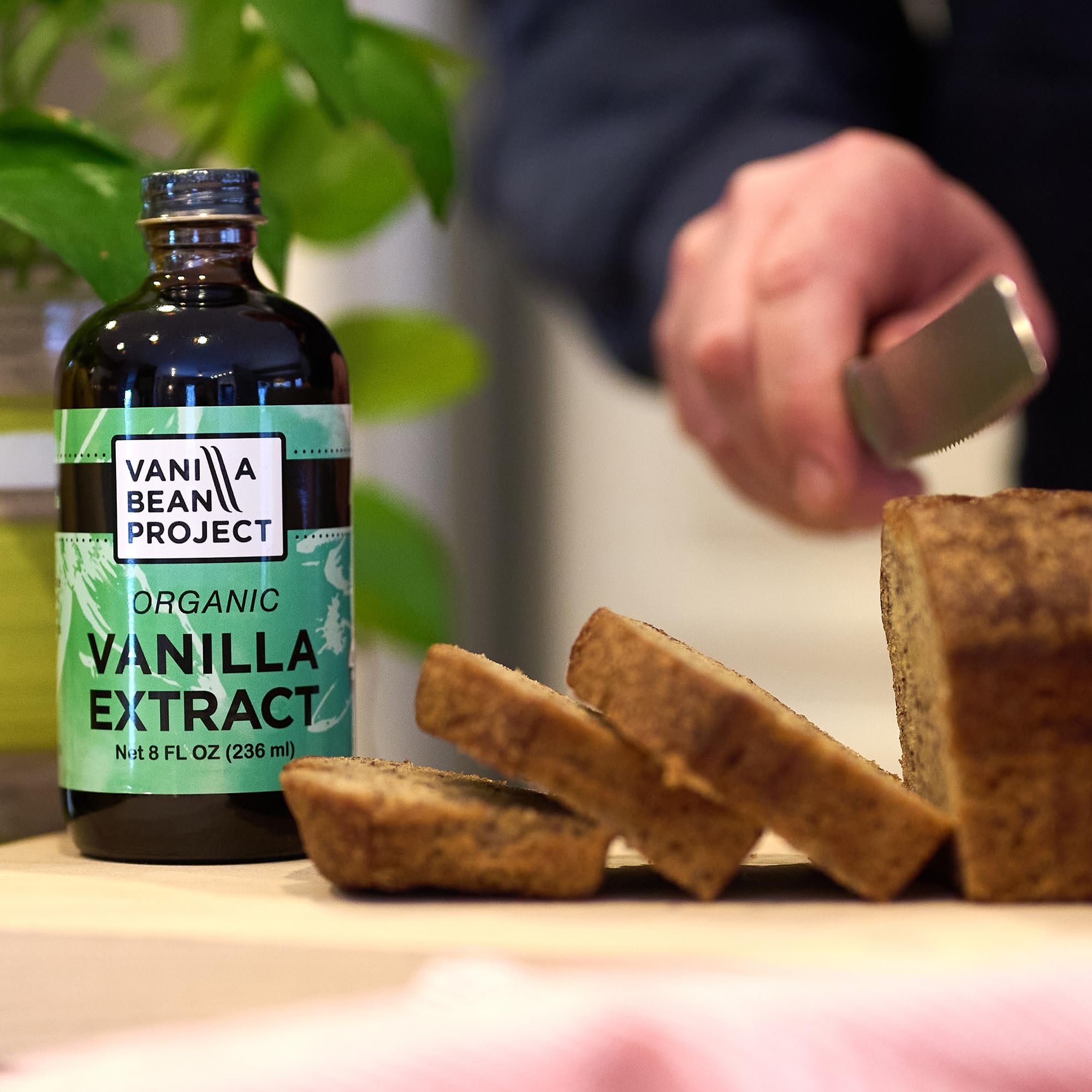 VANILLA BEAN PROJECT bottle next to measuring scale showing 8 oz size