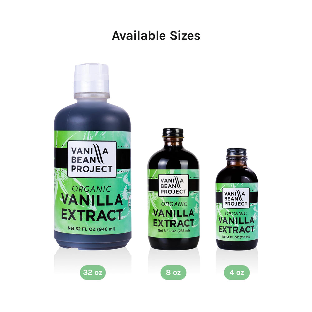 VANILLA BEAN PROJECT bottle beside whole vanilla beans for authentic flavor