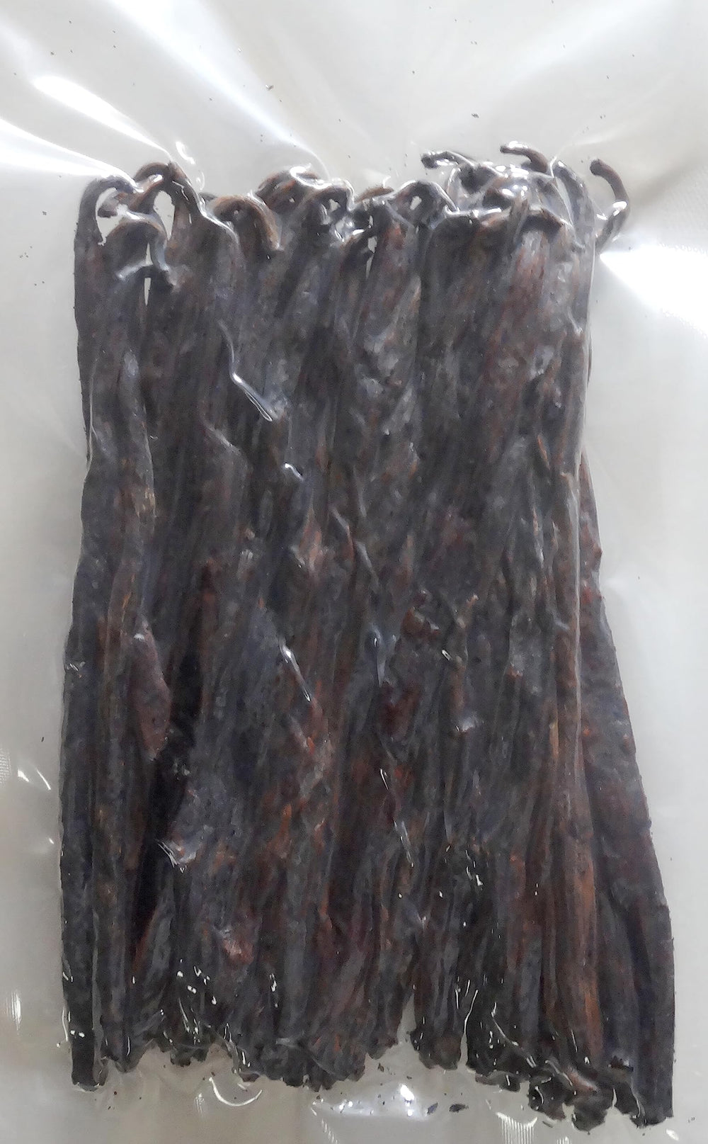 Vanilla Products USA close-up of split Madagascar beans revealing seeds for faster infusion