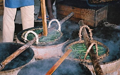 Home kitchen scene with Vanilla Products USA beans being prepared for extract