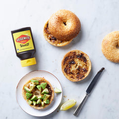 Vegemite Squeezy being used on toast showing quick application and convenience