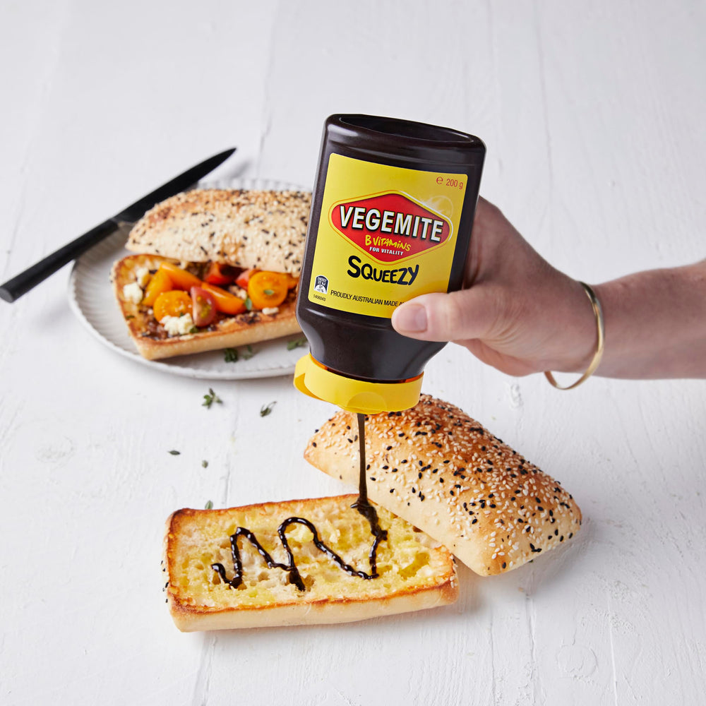 Vegemite Squeezy nozzle close-up with controlled flow for mess-free spreading