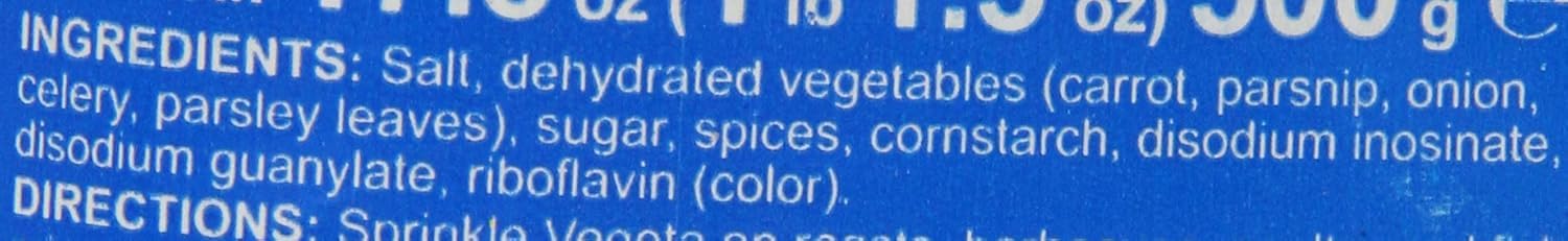 Vegeta seasoning sprinkled on roasted vegetables to enhance savory taste and color
