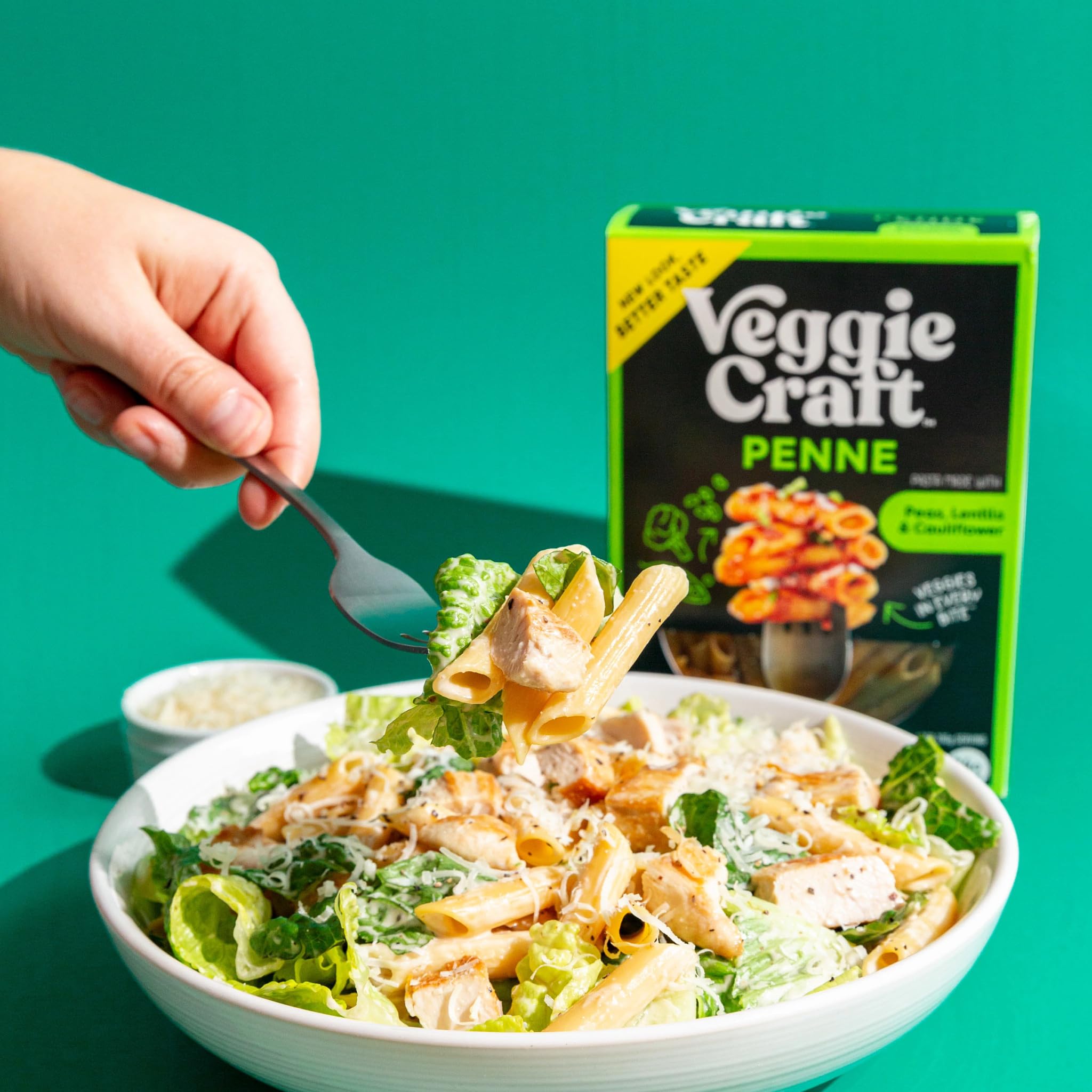 Veggiecraft Farms penne plated on a dinner table conveying family-friendly meal enjoyment