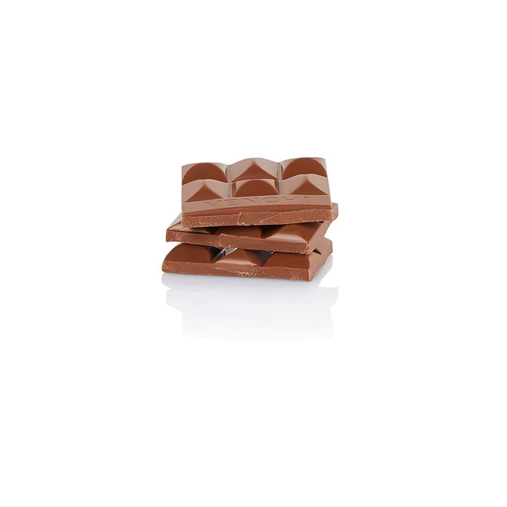 Venchi close-up texture of milk chocolate bar, showing smooth surface and creamy appeal
