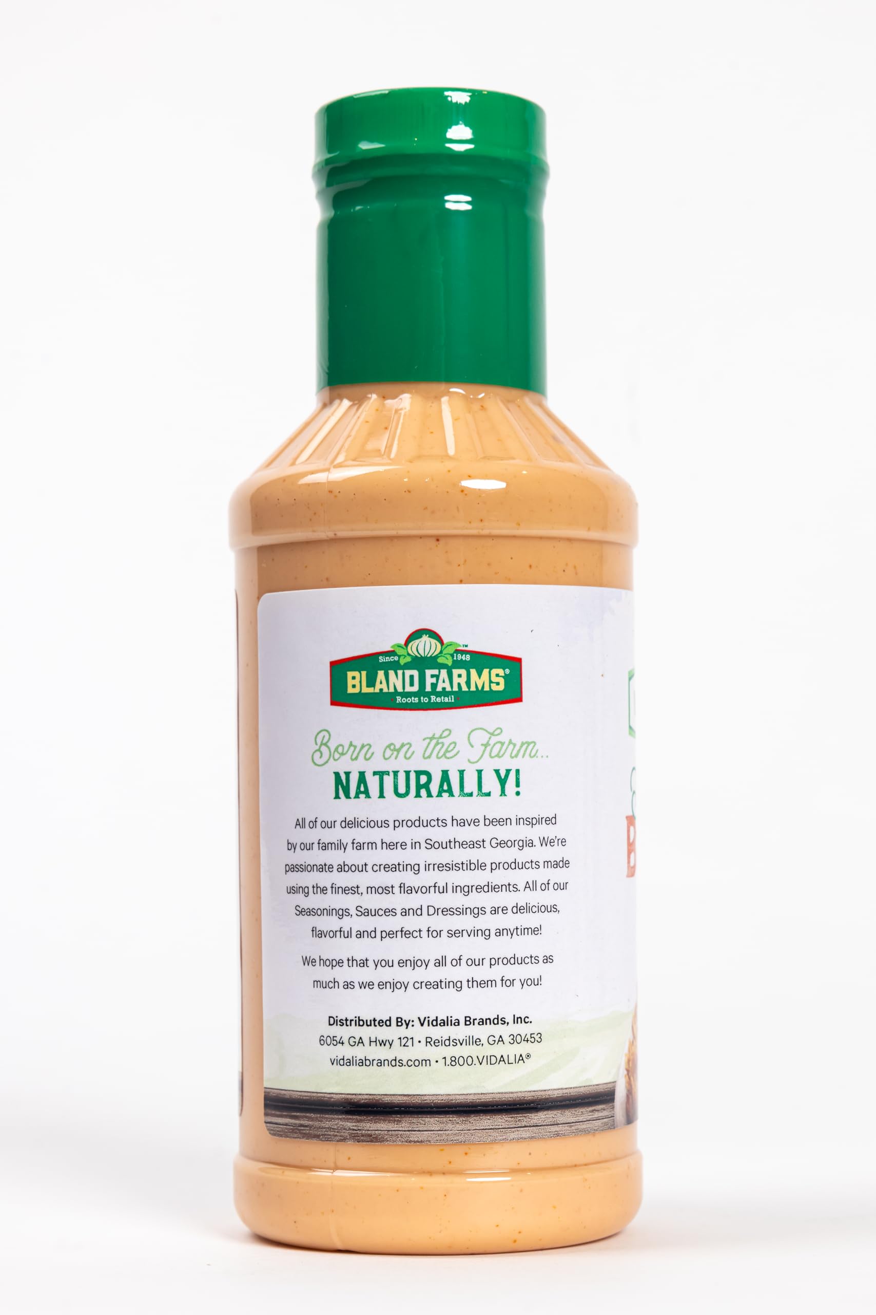 Vidalia Brands blossom sauce open with spoon ready to dip, enhancing appetizers