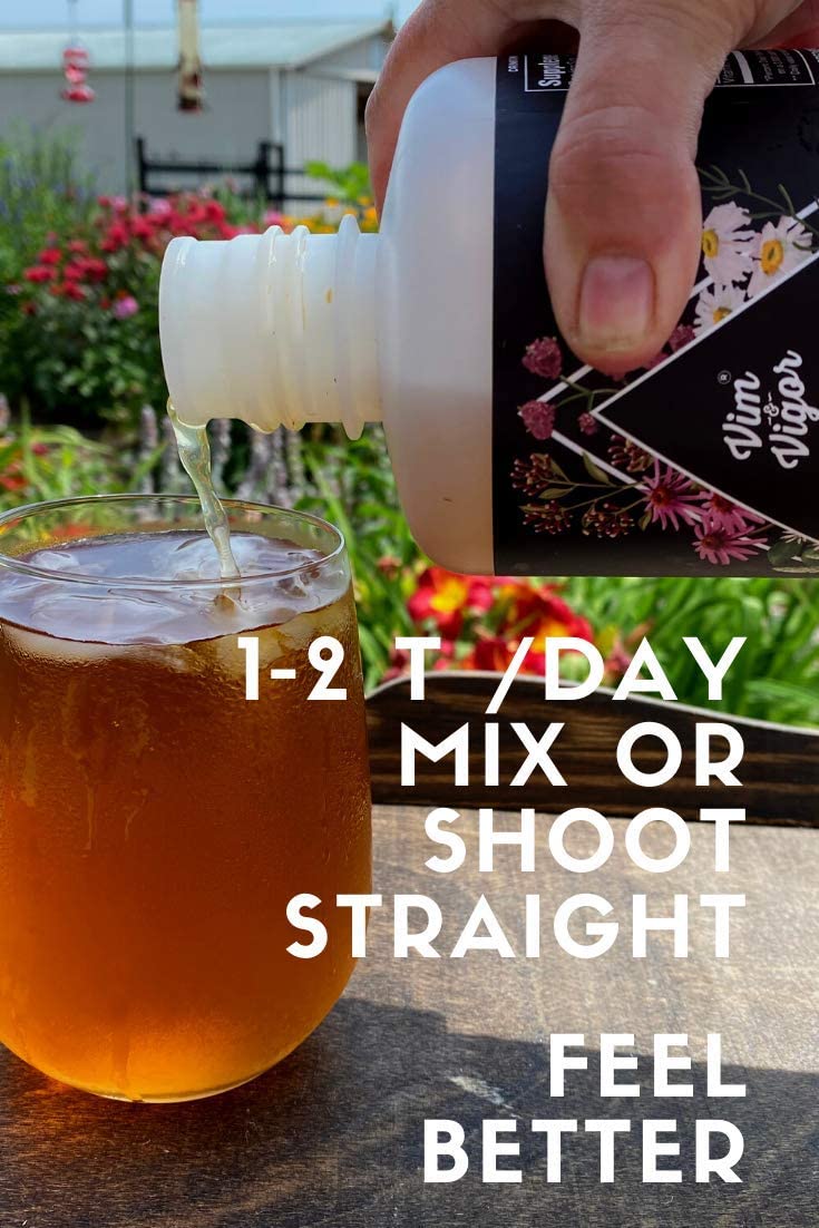 Vim & Vigor bottle next to hand showing single-shot portable size