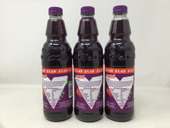 Pouring Vimto squash into a glass to demonstrate dilution and quick drink preparation benefit