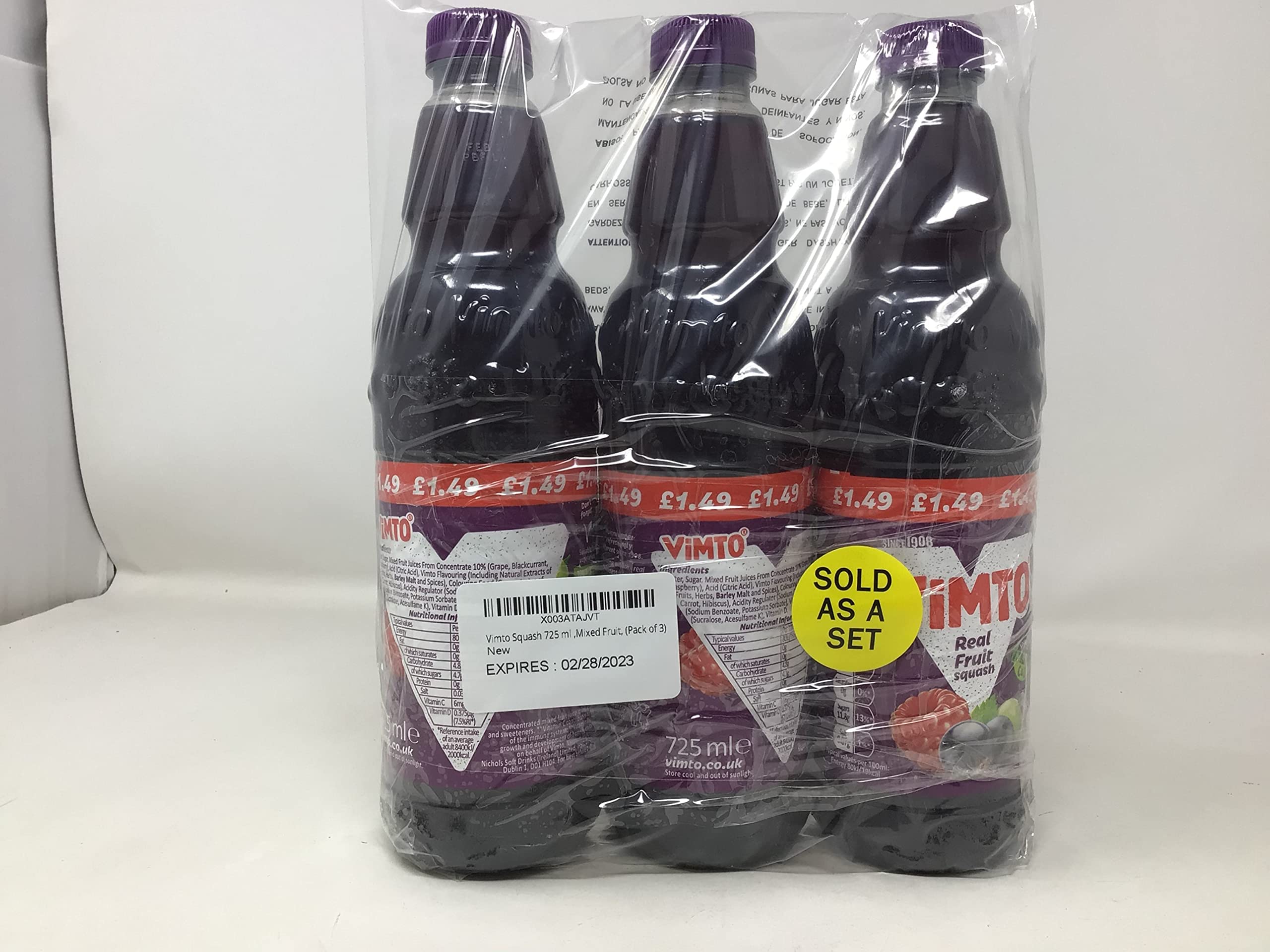 Chilled glass prepared from Vimto squash in fridge showing refreshing ready-to-serve convenience