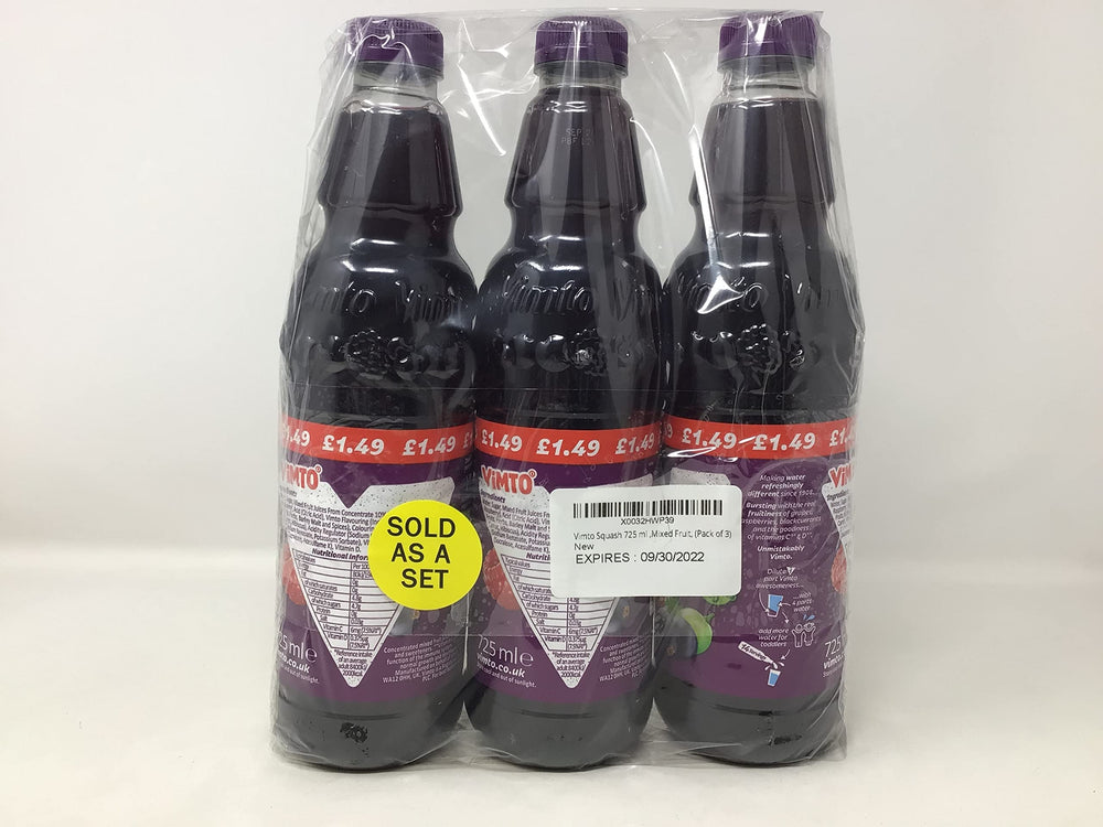 Hand holding Vimto 725ml bottle for scale, illustrating generous volume and economical servings