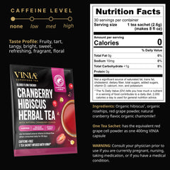 VINIA steeped cup with ruby red brew showing circulation-supporting ingredients