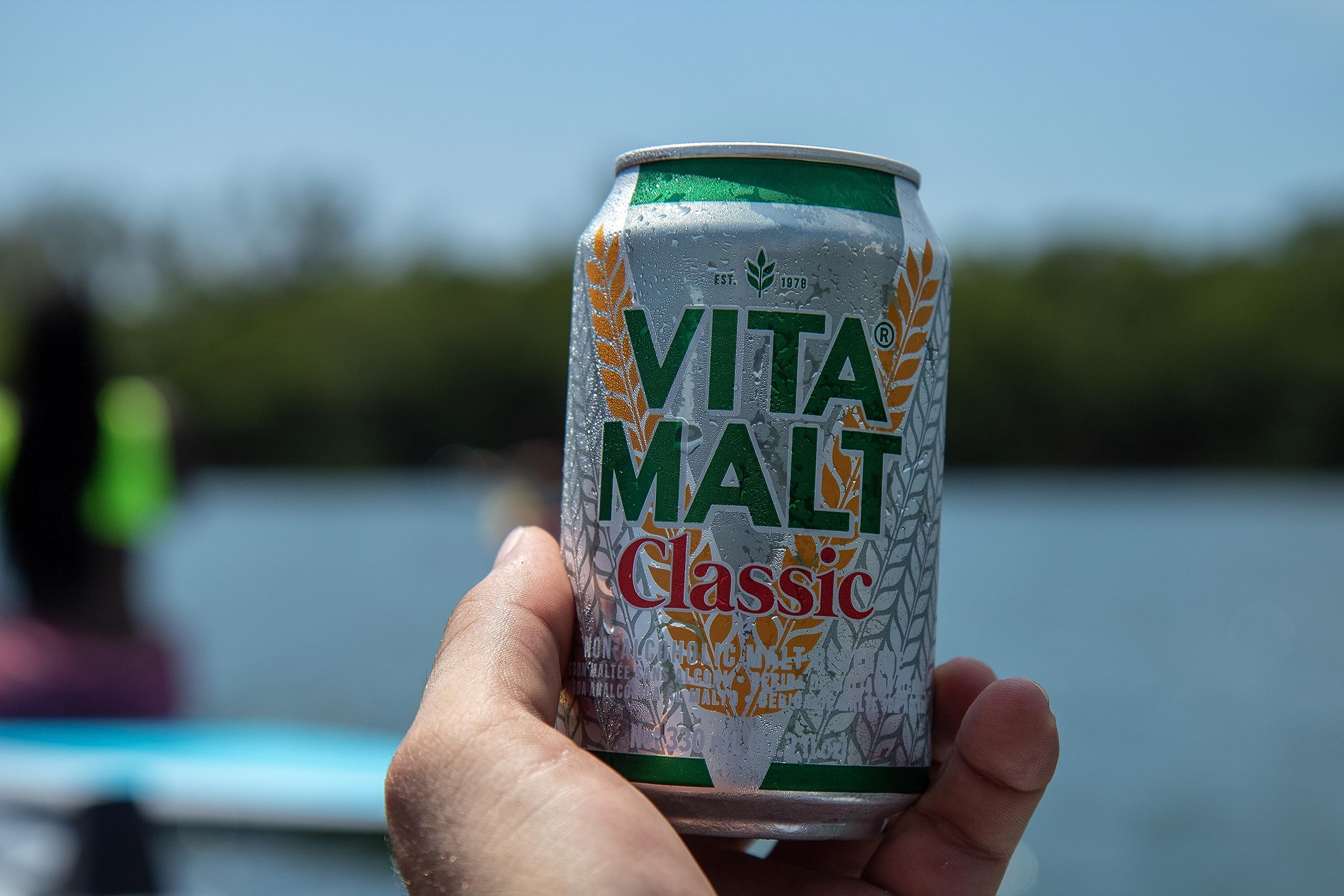 Vitamalt classic beside plated meal illustrating pairing and dining benefit
