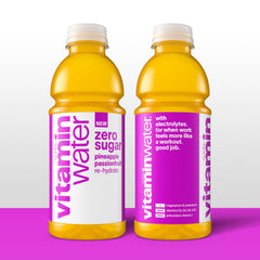 vitaminwater bottle in hand comparing size and portable hydration benefit