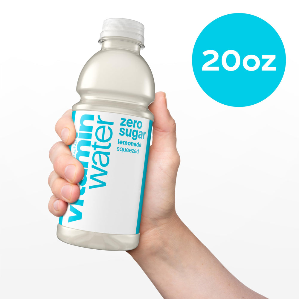 vitaminwater bottle held in hand showing 20 fl oz size convenience