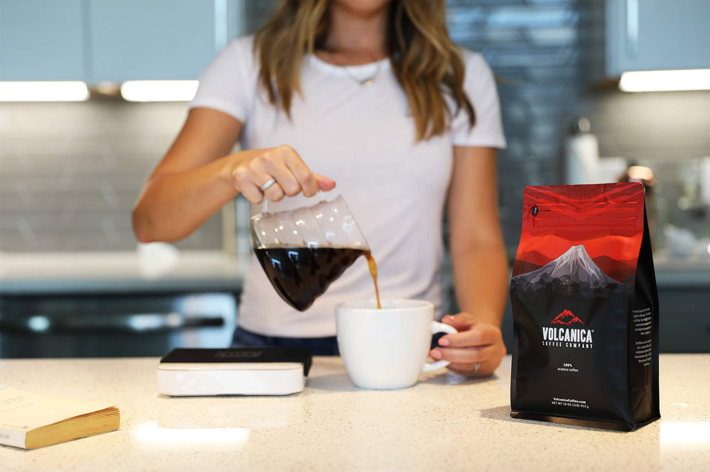 Close-up of Volcanica Coffee whole beans showing roast color and surface texture for quality
