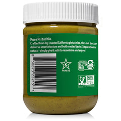 Vör spoonful of creamy pistachio butter demonstrating smooth spreadability benefit