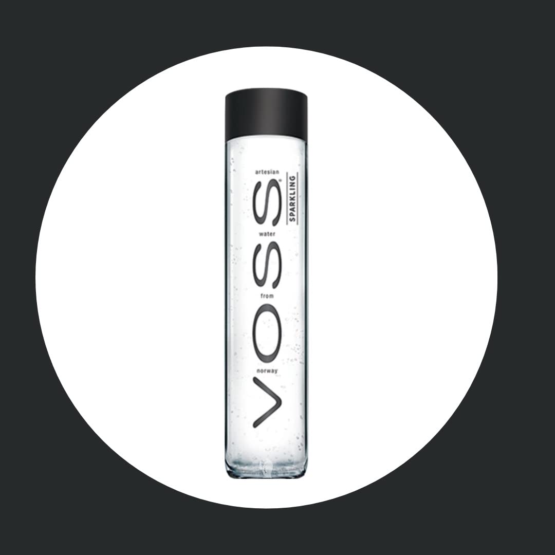 VOSS bottle in hand size comparison demonstrating portable, single-serve benefit