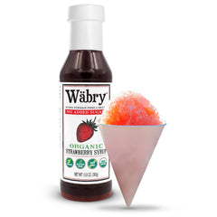 Wäbry pouring syrup over pancakes for flavorful low-sugar breakfast