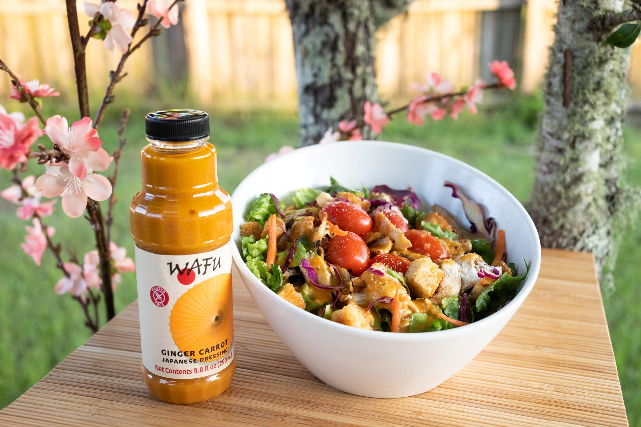 WAFU bottle next to utensils for scale, conveys convenient 9.8 ounce size