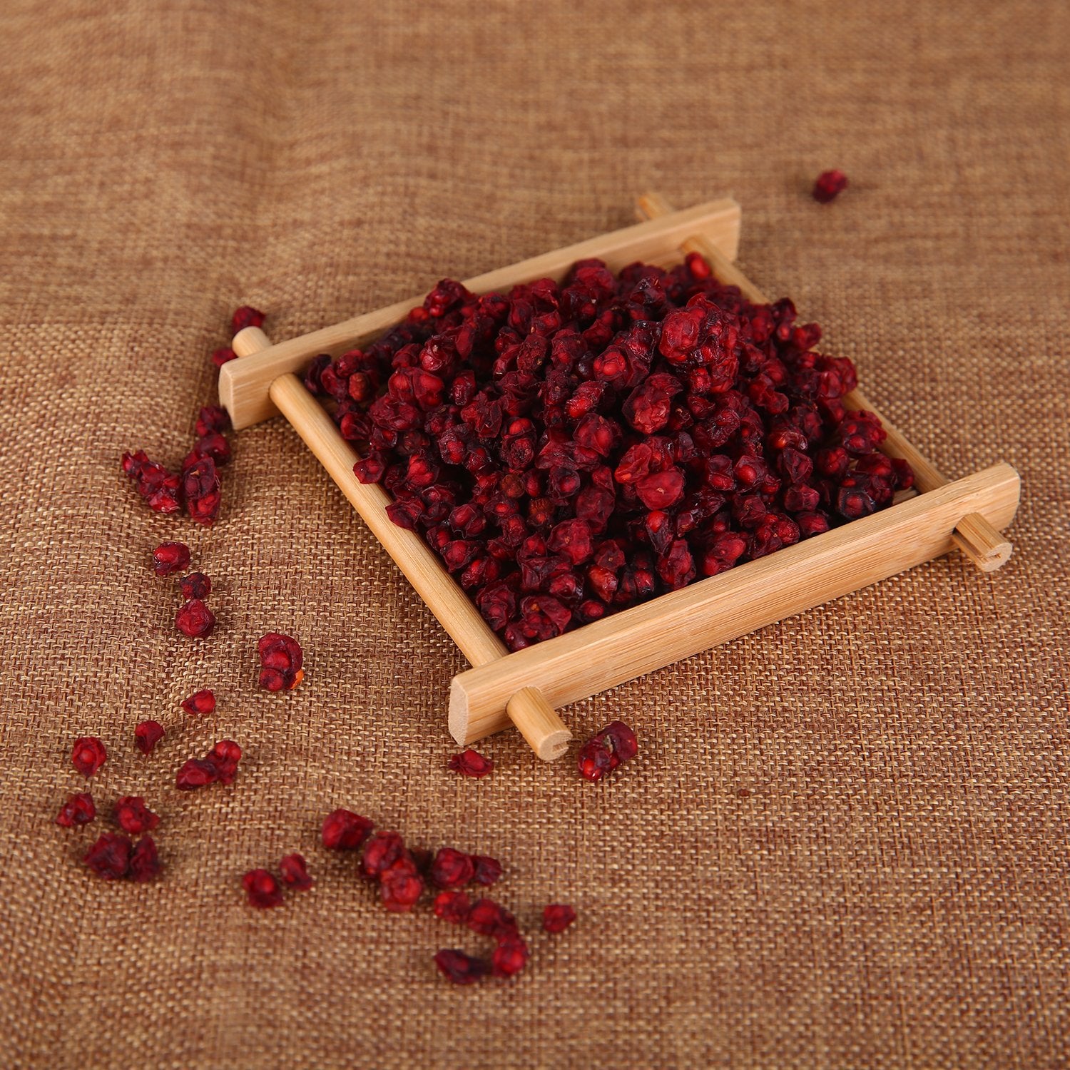 wananfu close-up of schisandra berry texture, visible moisture and freshness