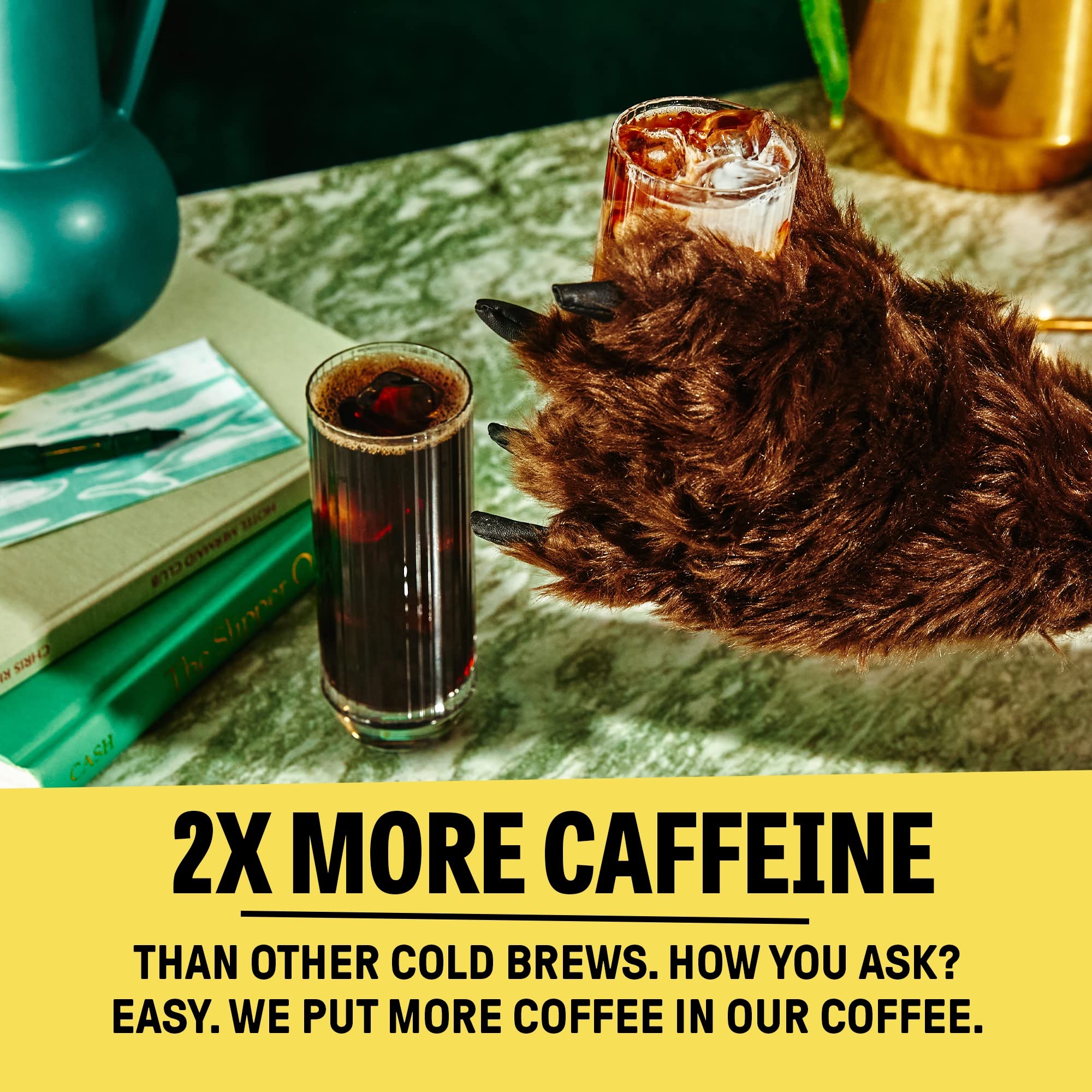Wandering Bear pouring cold brew over ice, refreshing drink ready quickly
