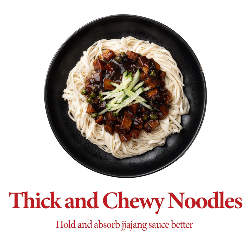 Wang noodles beside chopsticks to show scale and serving portion clarity