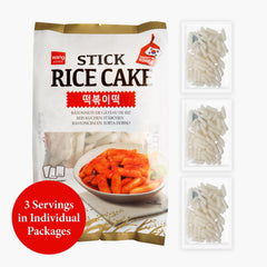 Wang rice cakes simmering in spicy sauce demonstrating sauce absorption
